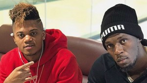 Leon Bailey e Usain Bolt: astros jamaicanos do futebol e do atletismo. Foto: Bundesliga
