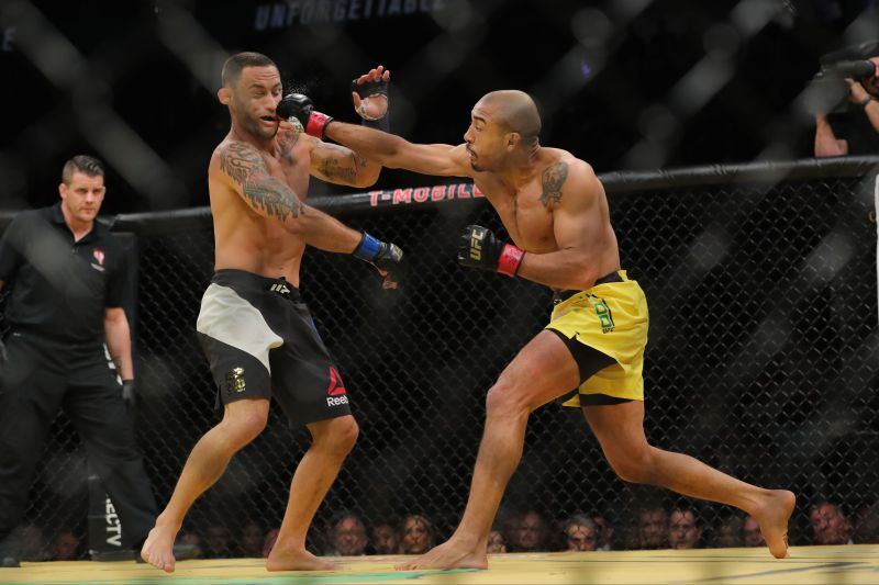 LAS VEGAS, NV - JULY 9: Jose Aldo punches Frankie Edgar during the UFC 200 event at T-Mobile Arena on July 9, 2016 in Las Vegas, Nevada. Rey Del Rio/Getty Images/AFP== FOR NEWSPAPERS, INTERNET, TELCOS & TELEVISION USE ONLY ==